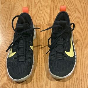 Nike women’s Black and Yellow Sneakers
